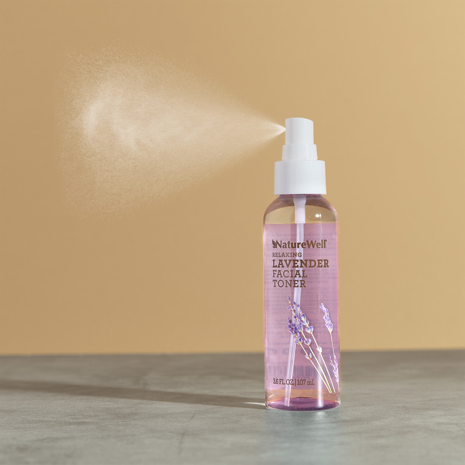 3.6 oz bottle of relaxing lavender facial toner with liquid misting from spray spout