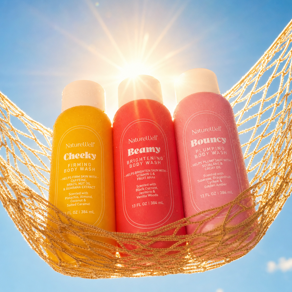 Bottles of NatureWell body washes on a light blue background