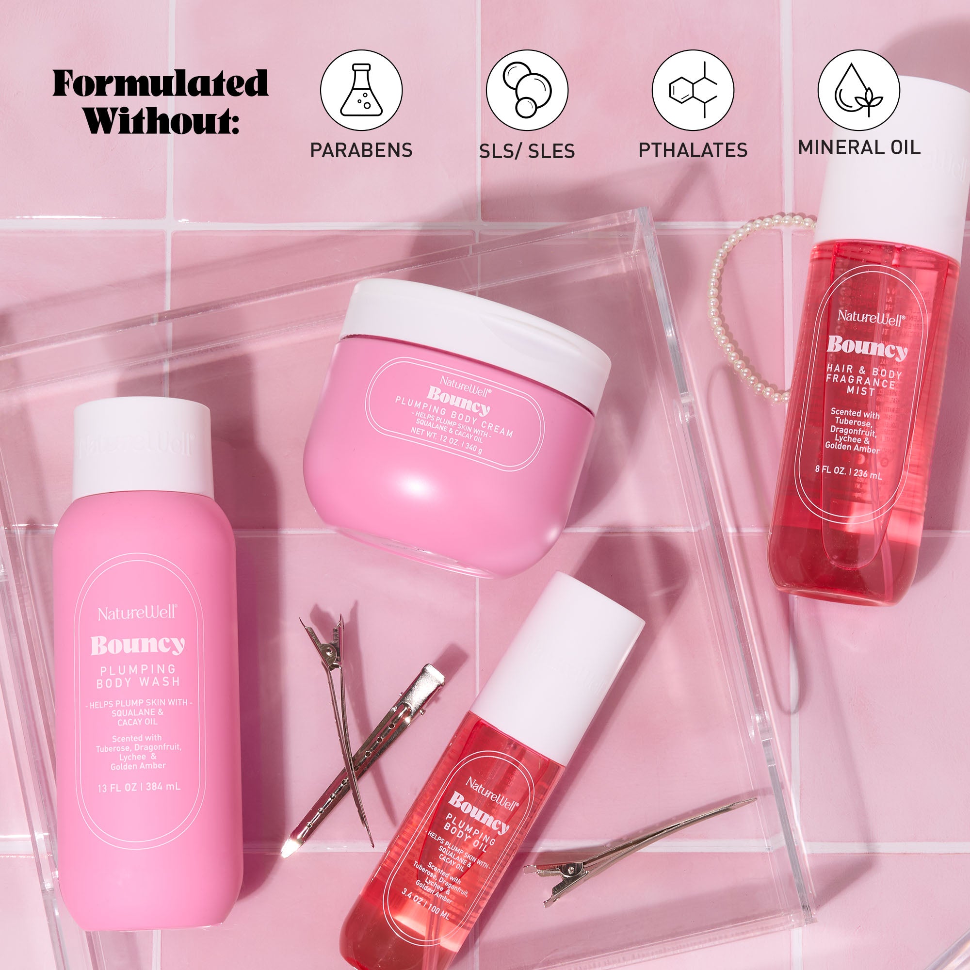 Collection of NatureWell Bouncy bodycare products on a pink background