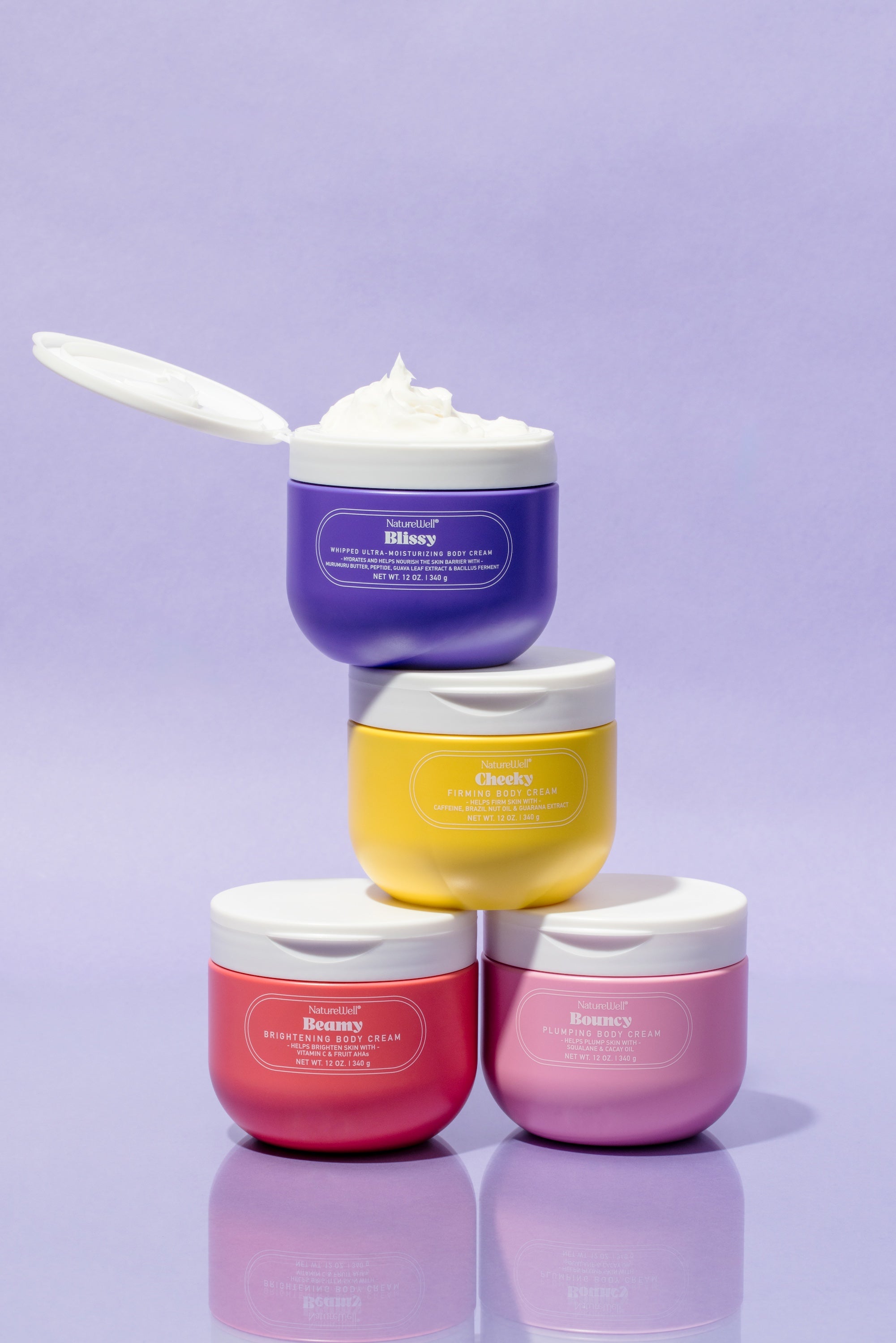 Assortment of NatureWell Body Creams including Beamy, Cheeky, Bouncy, and Blissy scents