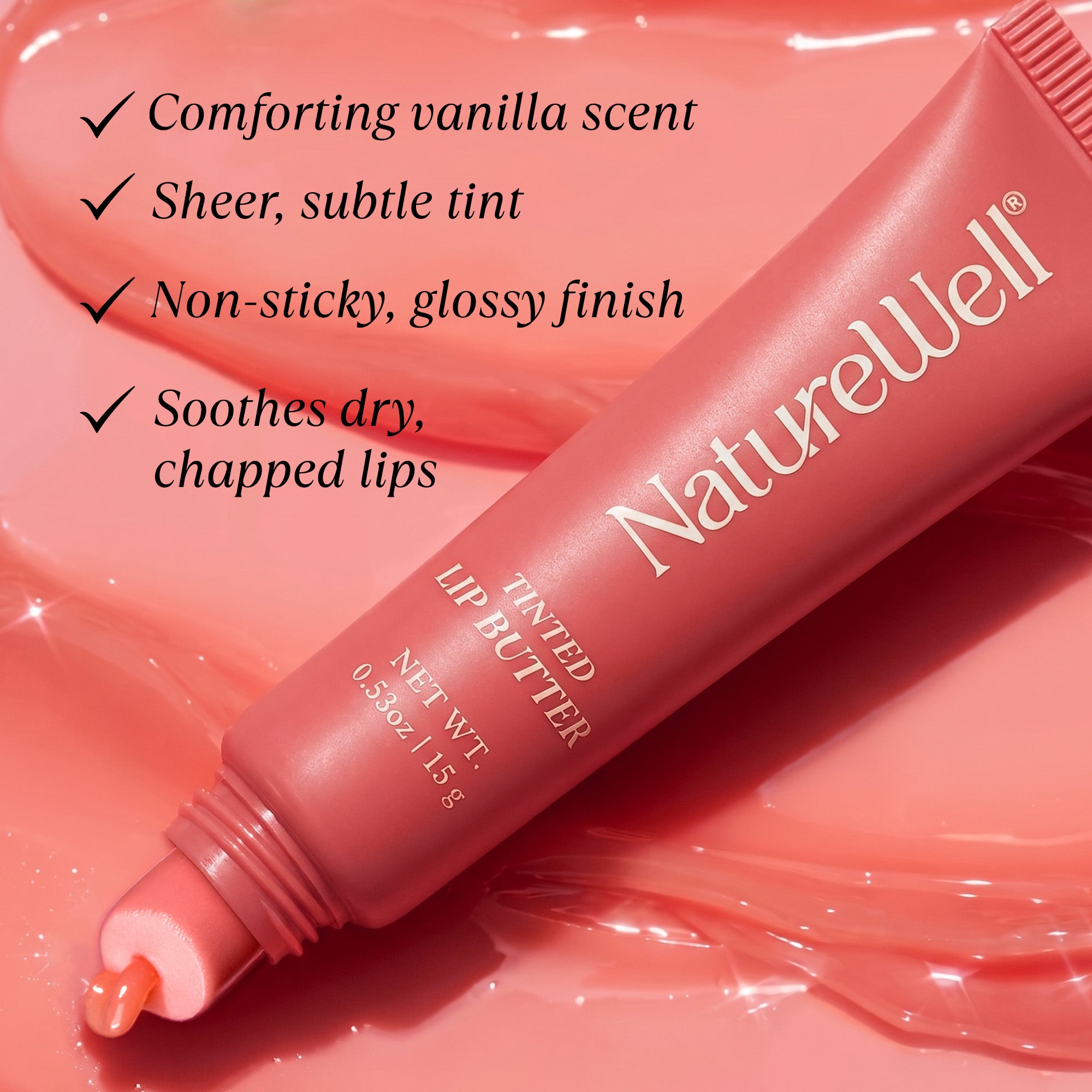 Tube of NatureWell Pink Velvet Lip Butter with benefits listed on a pink background