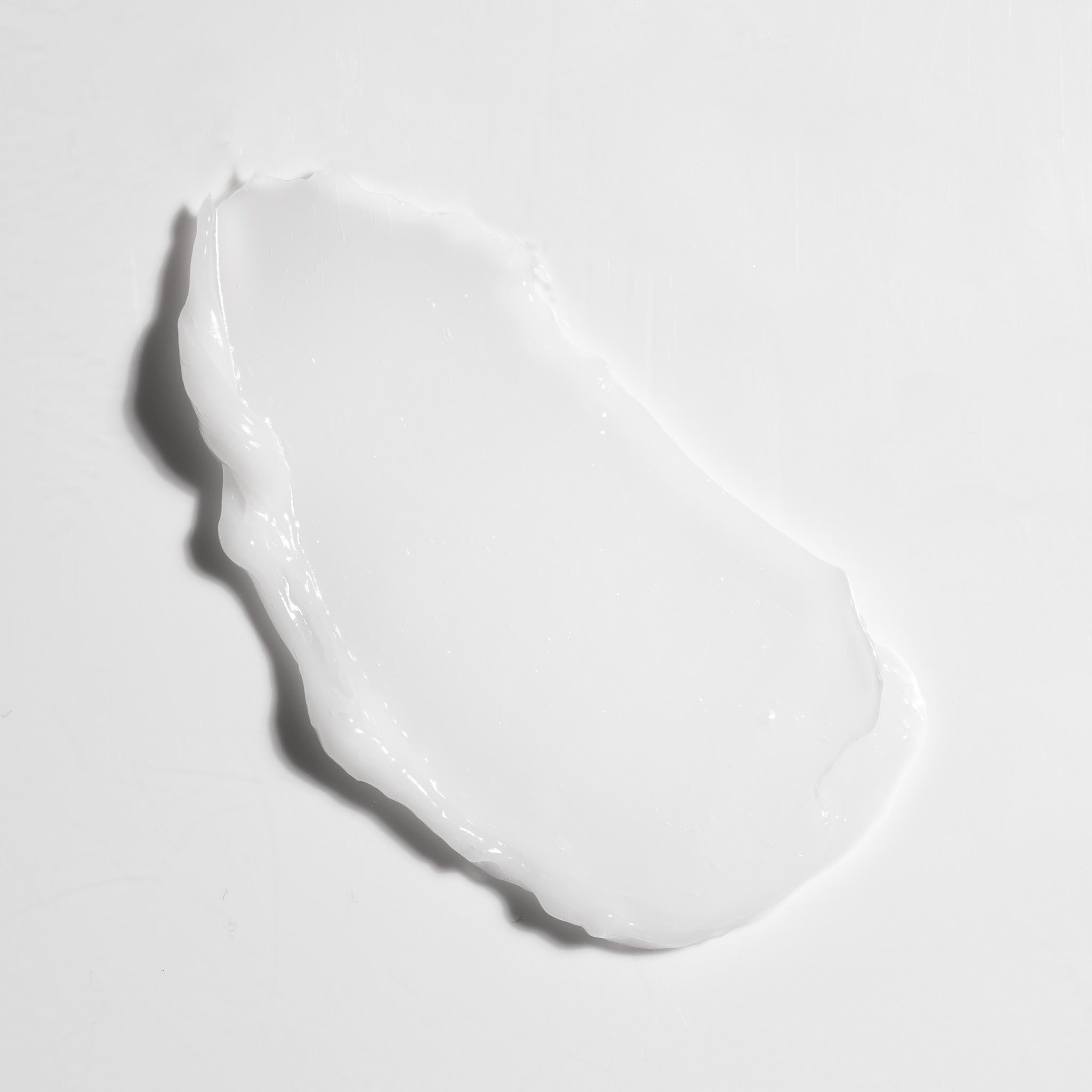 Close-up swatch of NatureWell SunRise Conditioner on a white background