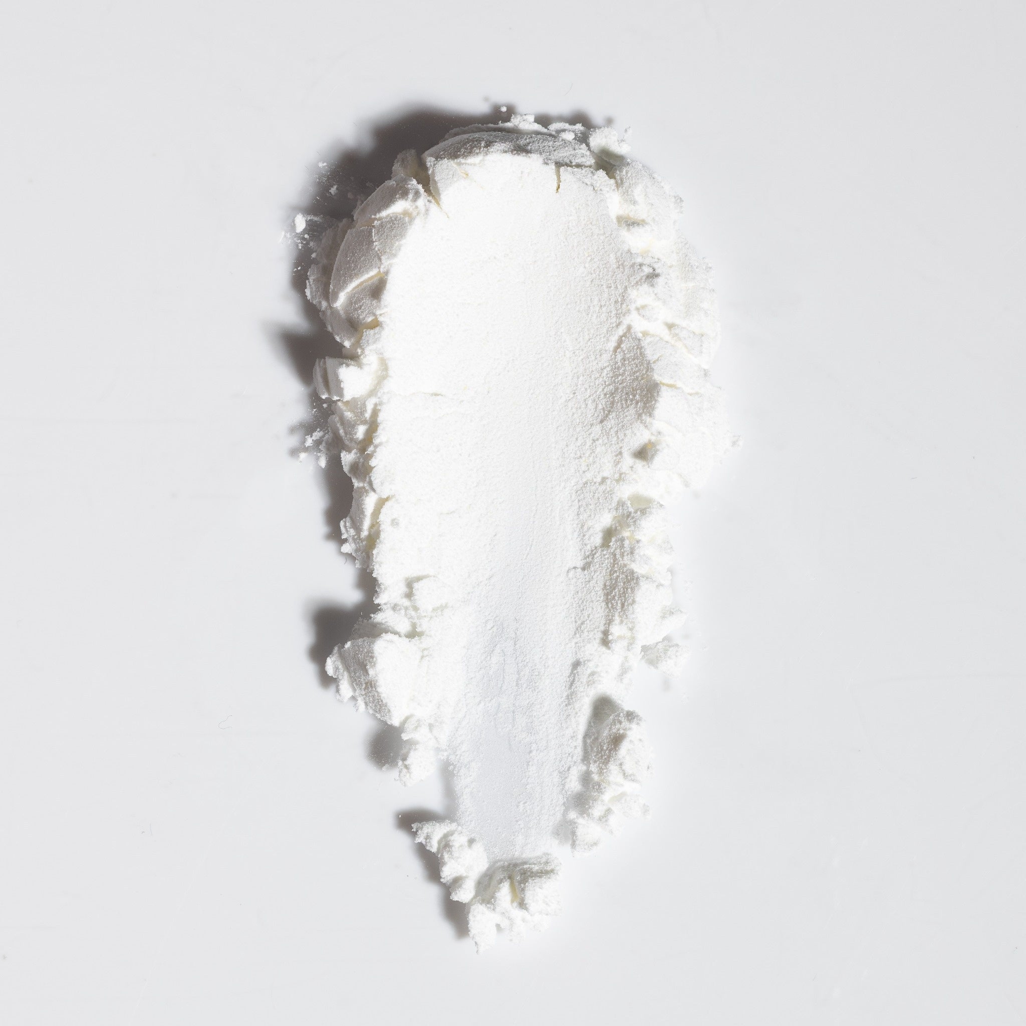 Close-up swatch of NatureWell SunRise Dry Shampoo on a white background