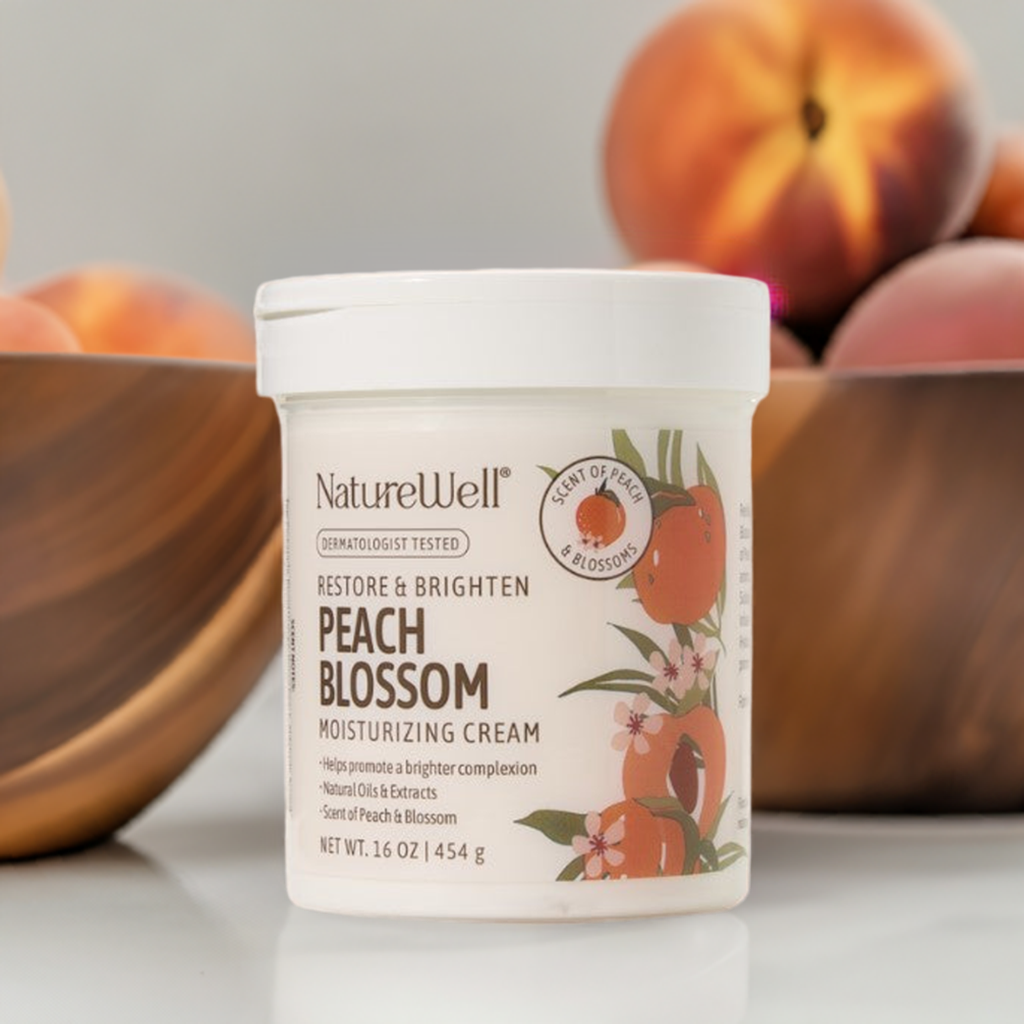 jar of moisturizing cream next to bowls of peaches