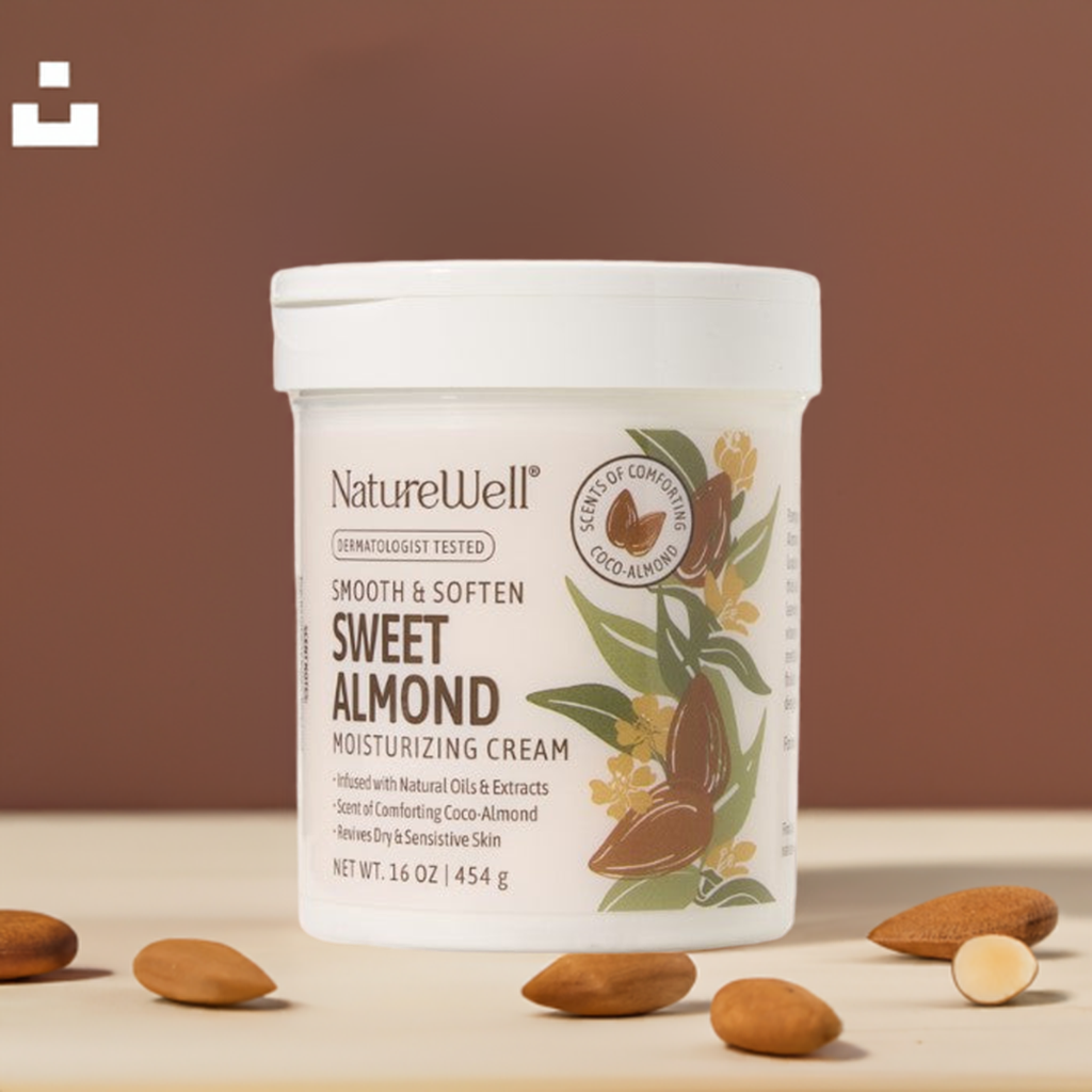 jar of sweet almond scented moisturizing cream on a table with almonds scattered in the foreground
