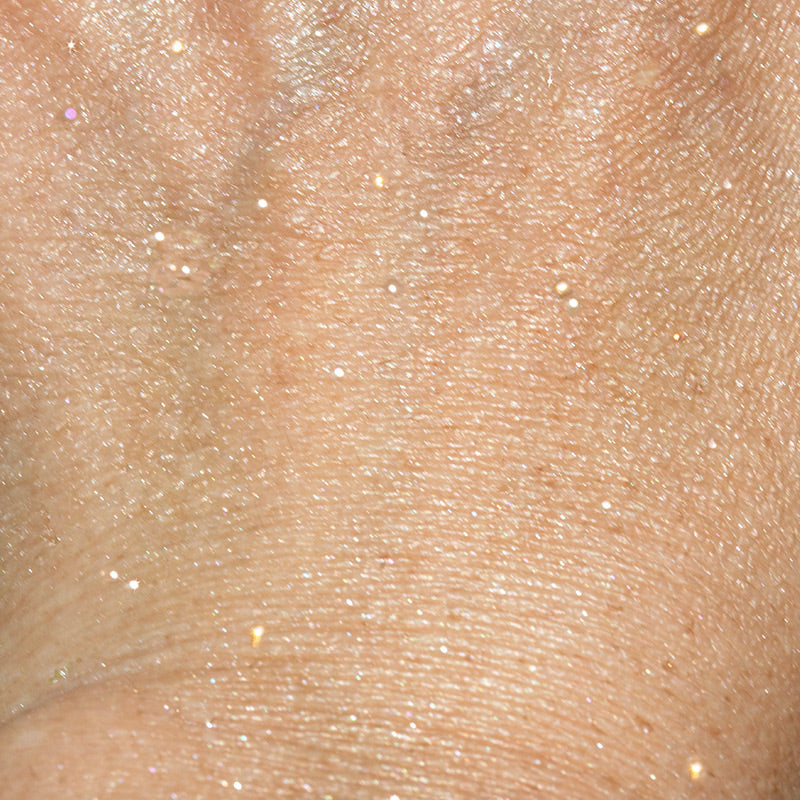 close up of shimmering effect on skin from shimmering vanilla moisturizing cream