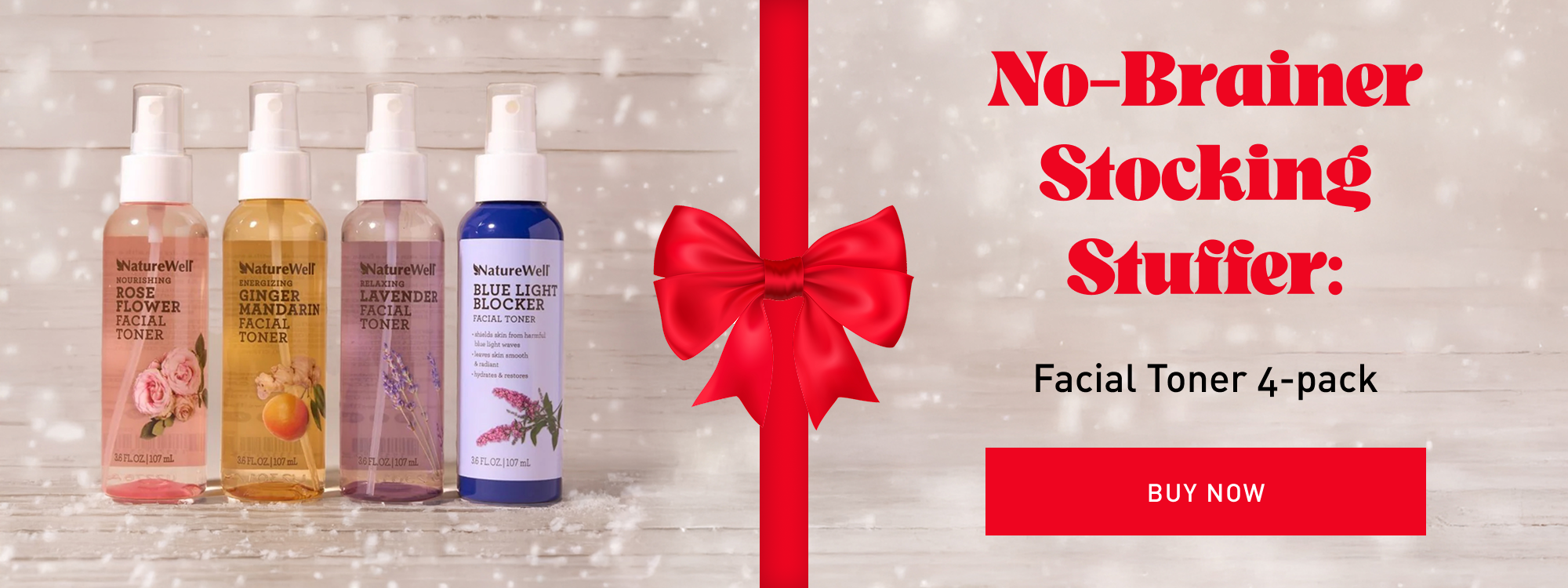 Four facial toner bottles with a red bow and text promoting a stocking stuffer offer.