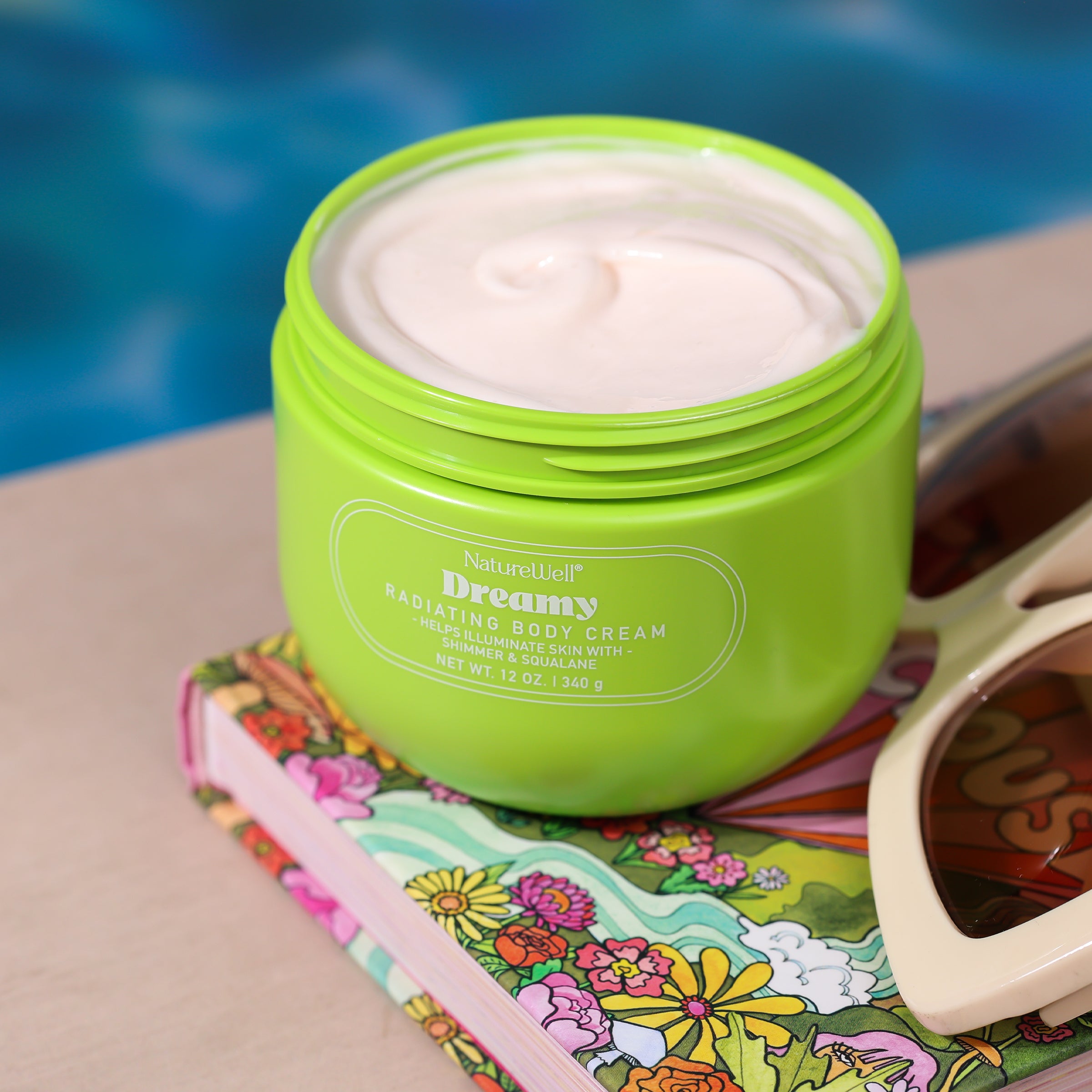 Open jar of NatureWell Dreamy Radiating Body Cream