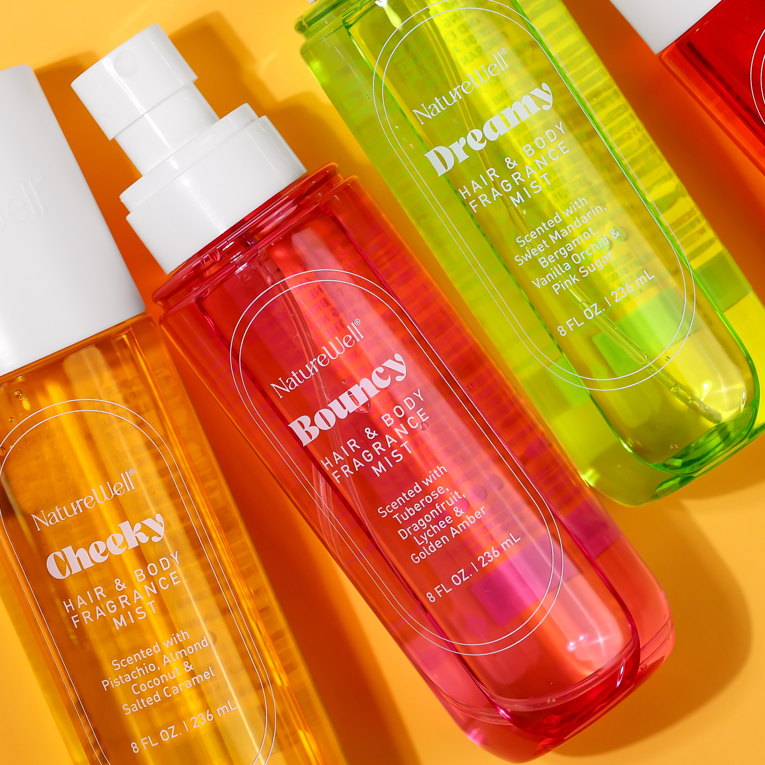 Bottles of NatureWell Hair and Body Fragrance Mist in 3 different scents