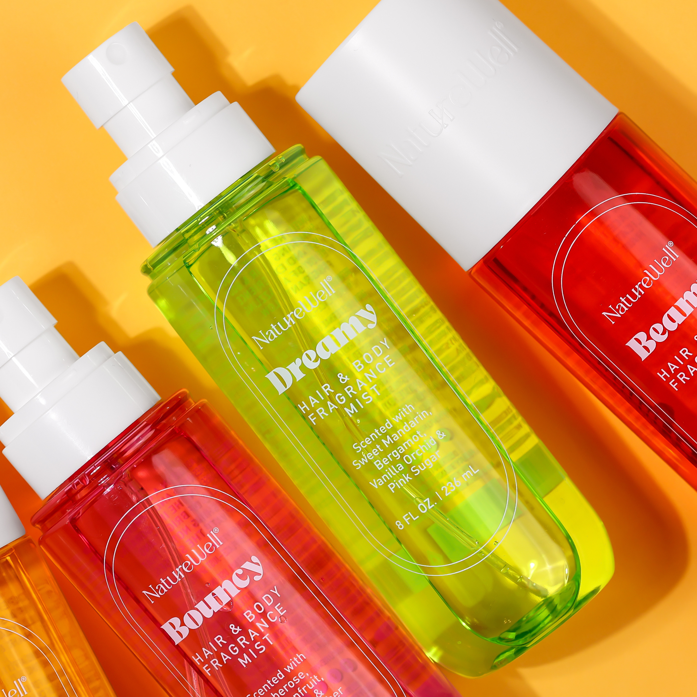 Bottles of NatureWell Hair and Body Fragrance Mist in 3 different scents