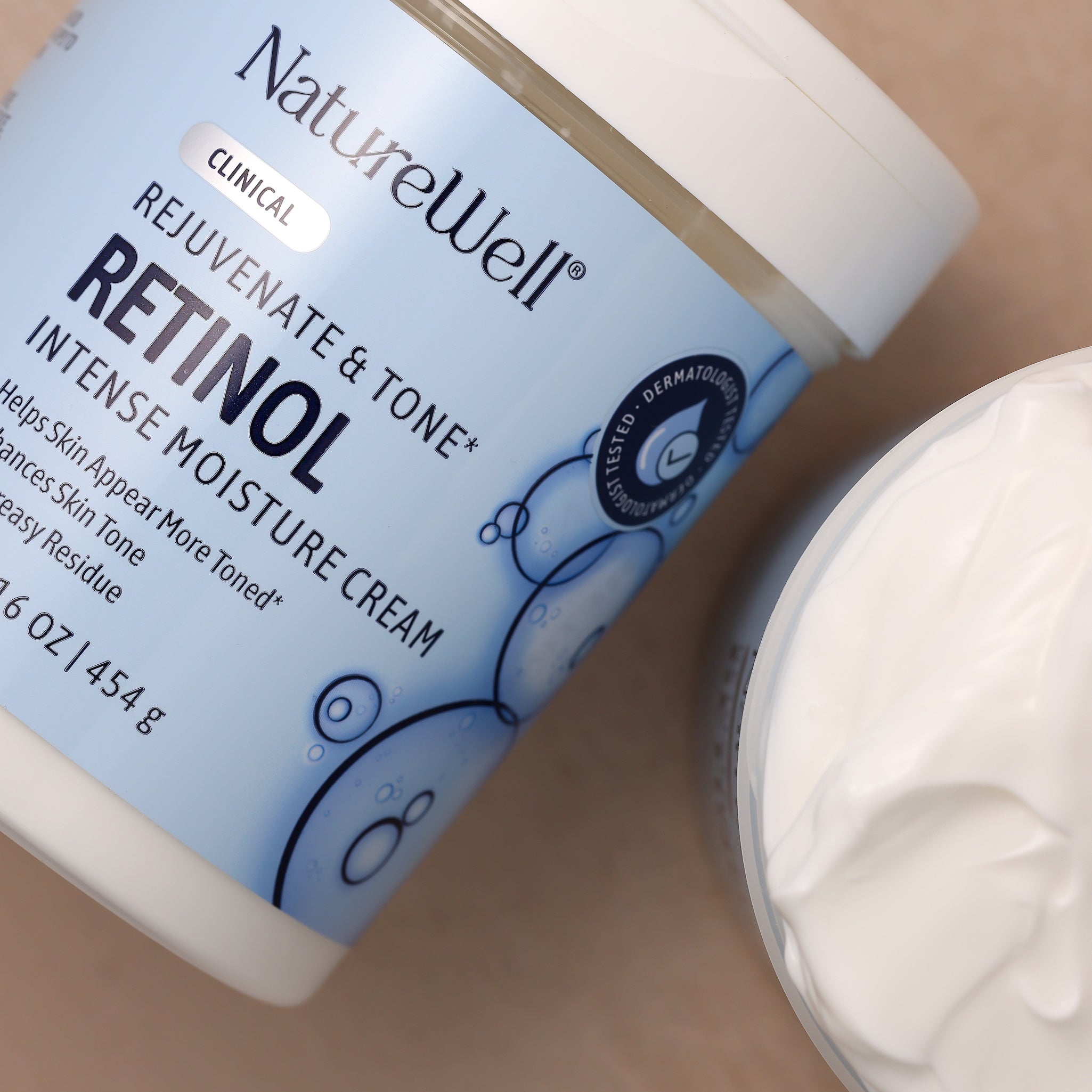 NatureWell Retinol cream container on a beige surface