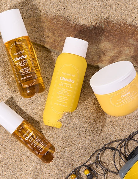 NatureWell Cheeky Collection including Firming Body Wash, Firming Body Cream, Firming Body Oil, and Hair and Body Fragrance Mist
