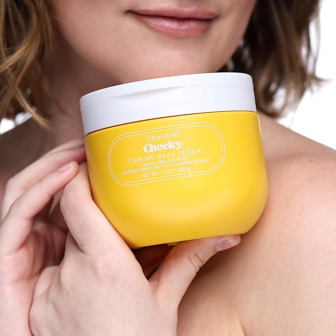 Woman holding a jar of NatureWell Cheeky Firming Body Cream next to her face