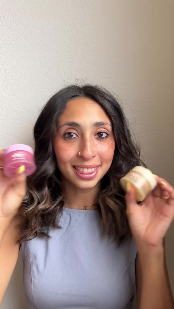 Smiling woman using NatureWell's Vanilla Glaze Hydrating Lip Mask and Berry Lip Mask