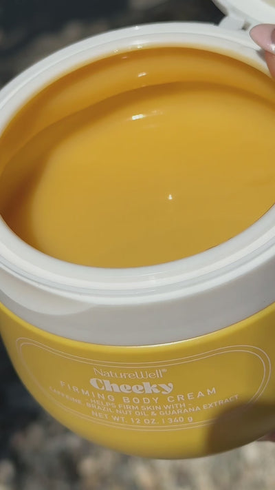 Woman showing her complete skincare routine using NatureWell Cheeky Firming Body Cream, Hair & Body Fragrance Mist, and Cheeky Firming Body Oil