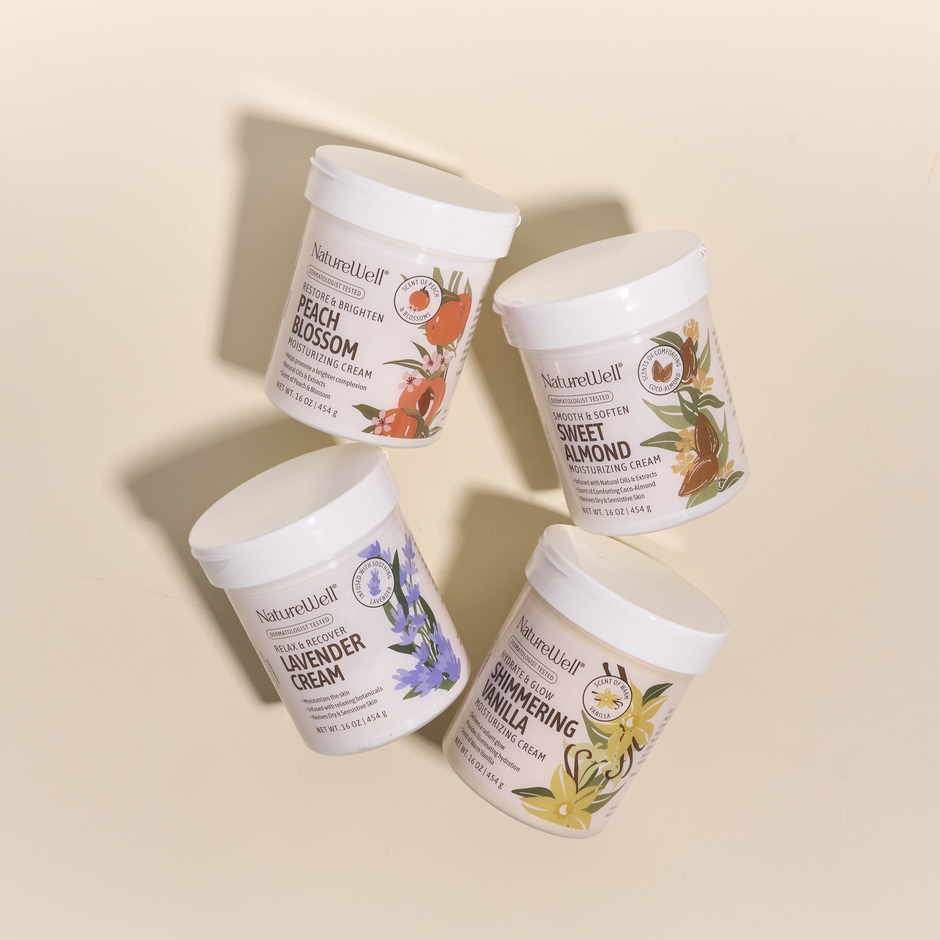 assortment of 4 jars of scented moisturizing body creams